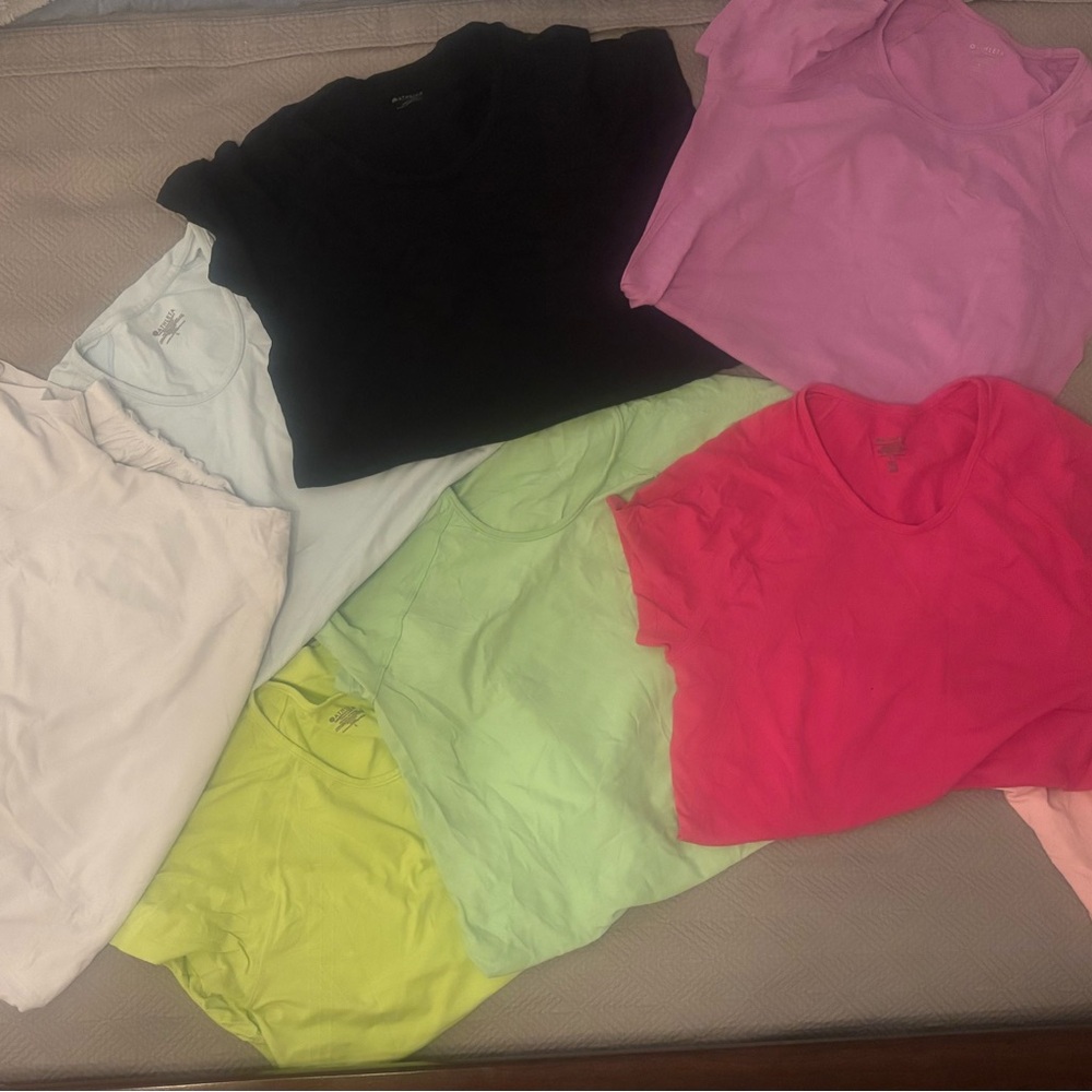 Various colors Momentum Seamless Tee from
Athleta.